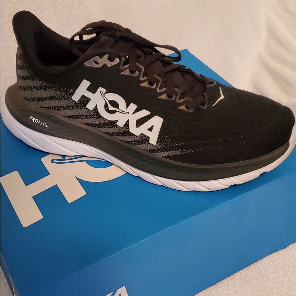 Black and white Hokas
